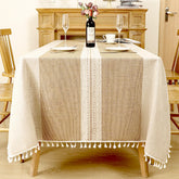 AIMHave modern botanical palm leaf linen look tablecloth featuring white tropical foliage on a rich coffee brown dining table