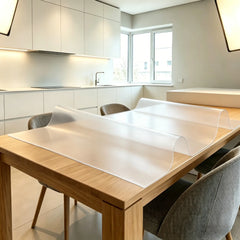 Frosted PVC mat showing high flexibility and translucent matte finish, ideal for kitchen and dining areas.