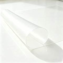 Frosted PVC bathroom mat with curved edge to show its soft texture and stay-flat design on wet tile floors.