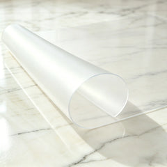 Frosted PVC entry mat with curved edge to show its soft texture and stay-flat design for hallway floors.