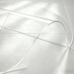 Round clear PVC bathroom mat showing 1.5mm material flexibility, waterproof and durable for shower areas.