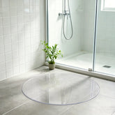 Round clear PVC bathroom mat, waterproof and non-slip floor protector for shower, bath, and vanity areas.