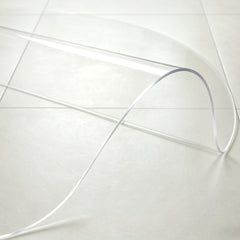 Close-up of round PVC mat being bent, showing 1.5mm flexible and durable material for long-lasting entryway use.