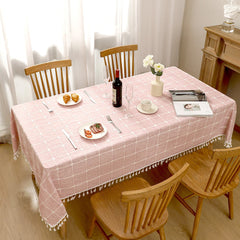 Top view of AIMHave romantic pink botanical flower poly-cotton tablecloth styled with plates and croissants