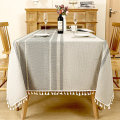 AIMHave modern bohemian geometric linen look tablecloth featuring off-white Moroccan tribal border patterns on a grey dining table