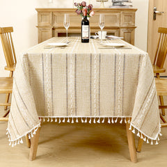 AIMHave modern vertical stripe linen look tablecloth featuring multi-width coffee brown and white lines with tassels on a dining table