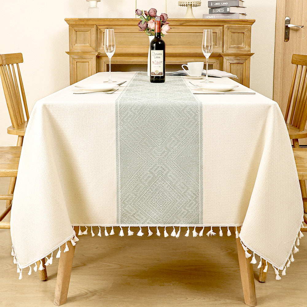 AIMHave modern minimalist waffle grid linen look tablecloth featuring micro sage green and white checks with tassels on a dining table