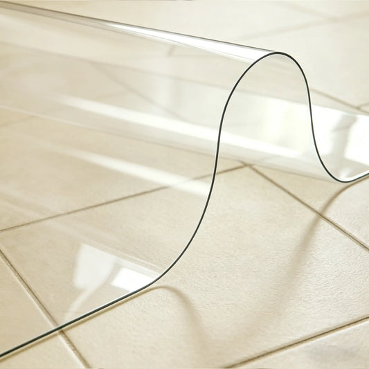 Clear PVC laundry mat showing 1.5mm material flexibility and high transparency for floor protection.