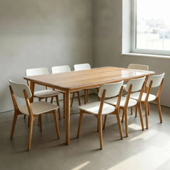 Clear PVC table protector on a large 8-person dining table for surface protection.