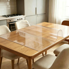 Taransparent PVC mat showing 1.5mm material flexibility and high clarity for dining table floor protection.